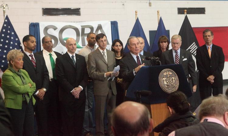 INVESTIGATION: Bloomberg calls for investigation into the matter of sanitation workers deliberately slowing down clean-up work during a Q&A at a press conference Thursday. (Gary Du/The Epoch Times)