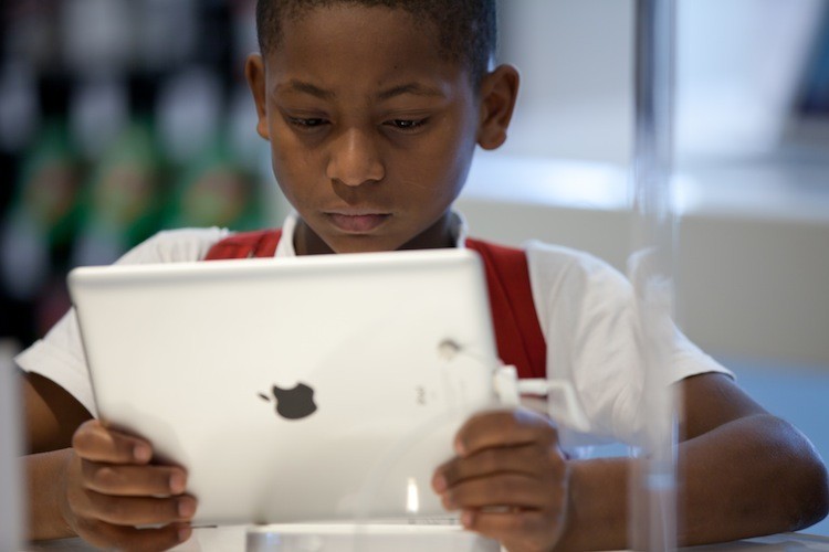 A boy looks at an iPad at the an Apple retail store. A recent report by the Global Information Industry Center warns that due to the increasing demands placed on the U.S.'s wireless infrastructure, demand will outstrip capacity unless steps are taken to provide more bandwidth for future generations. (Yasuyoshi Chiba/Getty Images) A boy looks at an iPad at the an Apple retail store. A recent report by the Global Information Industry Center warns that due to the increasing demands placed on the U.S.'s wireless infrastructure, demand will outstrip capacity unless steps are taken to provide more bandwidth for future generations. (Yasuyoshi Chiba/Getty Images)