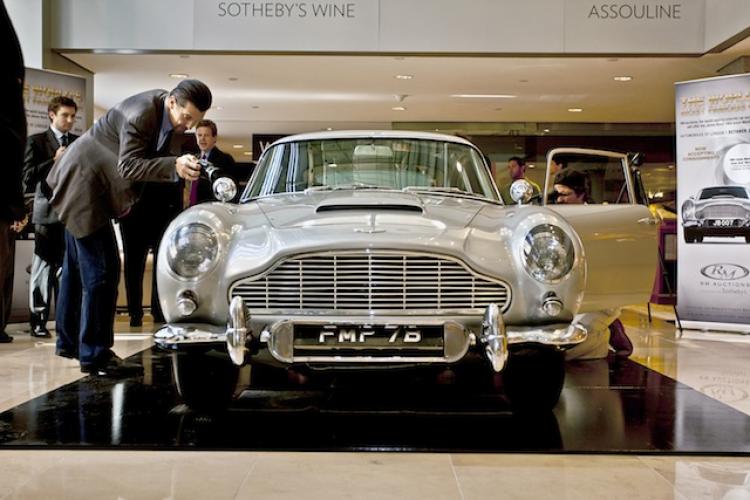 BOND, JAMES BOND: The Aston Martin DB5 used in bond films Thunderball and Goldfinger on display at Sotheby's New York. The famous movie car will be auctioned in London on Oct. 27. (Henry Lam/The Epoch Times) BOND, JAMES BOND: The Aston Martin DB5 used in bond films Thunderball and Goldfinger on display at Sotheby's New York. The famous movie car will be auctioned in London on Oct. 27. (Henry Lam/The Epoch Times)