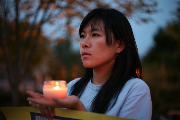 JIN PANG: In front of the Chinese embassy in Washington, D.C. protesting, July 30 for her mother's 7 year prison sentence by the Chinese communist regime for practicing Falun Gong. (John Yu/The Epoch Times)