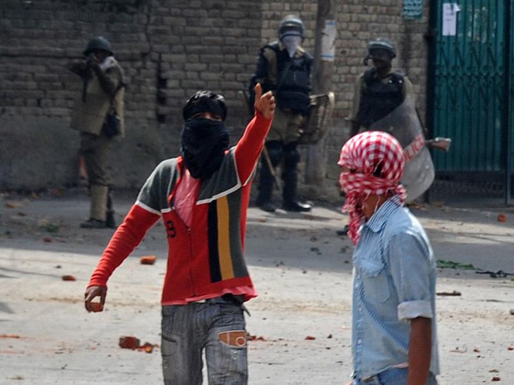 Masked Kashmiri protestors walk away from Indian police during clashes in Srinagar on September 15, 2010. (Tauseef Mustafa/AFP/Getty Images) Masked Kashmiri protestors walk away from Indian police during clashes in Srinagar on September 15, 2010. (Tauseef Mustafa/AFP/Getty Images)