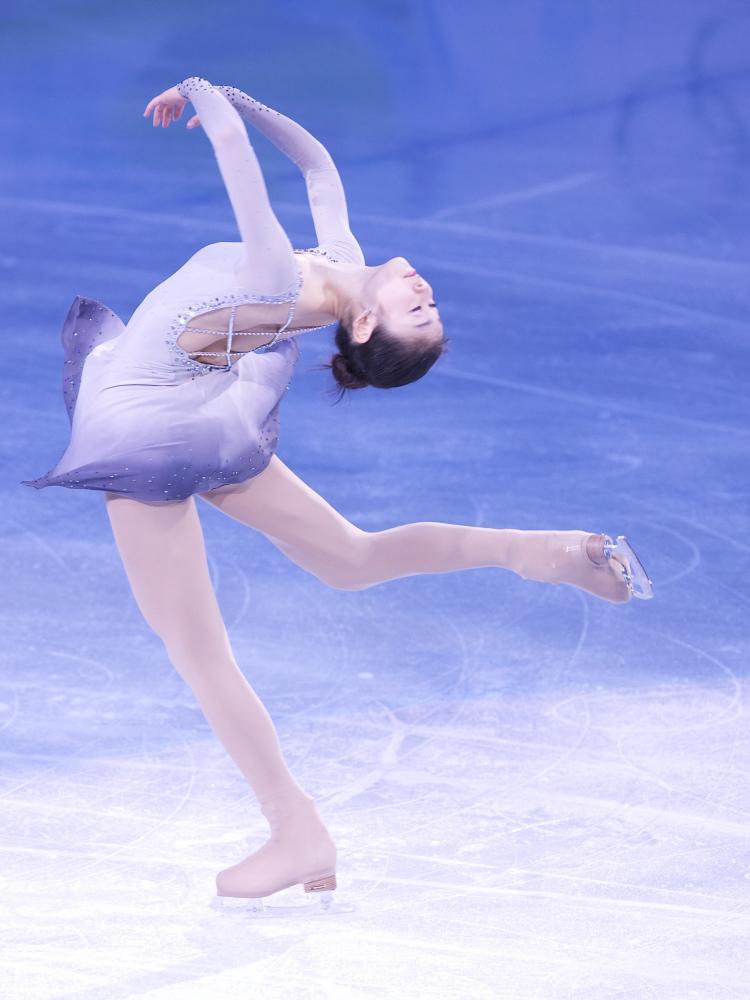 Kim Yu-Na, pictured skating during the 2010 Vancouver Winter Olympics, reportedly is separating with her coach Brian Olson. (Matthew Little/The Epoch Times)