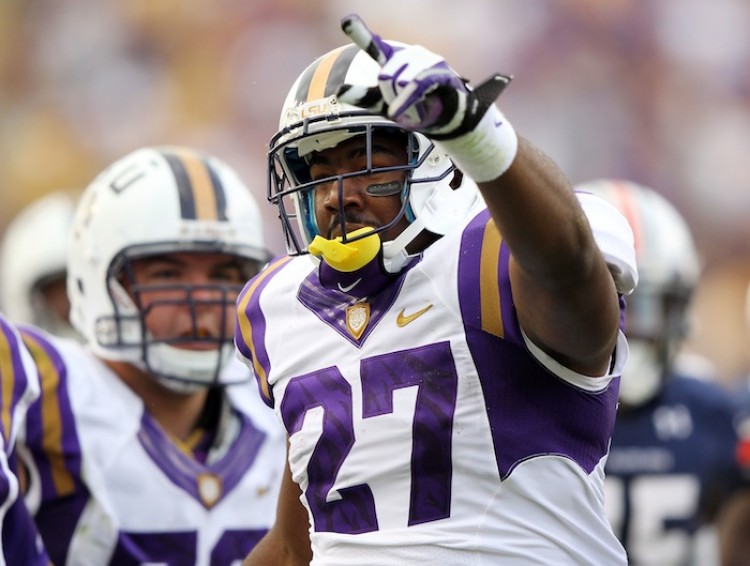 Kenny Hilliard of LSU celebrates a TD against Auburn on Saturday. The Tigers remained No. 1 in the AP polls, but will face No. 2 Alabama this Saturday. (Jamie Squire/Getty Images) Kenny Hilliard of LSU celebrates a TD against Auburn on Saturday. The Tigers remained No. 1 in the AP polls, but will face No. 2 Alabama this Saturday. (Jamie Squire/Getty Images)