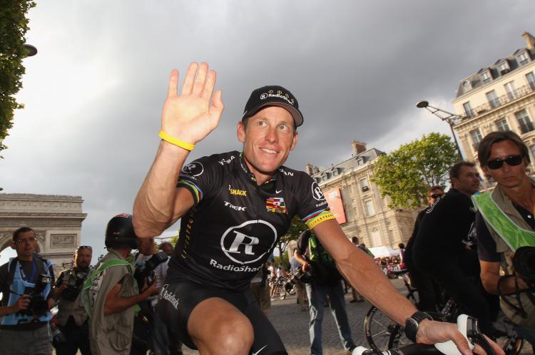 Lance Armstrong waves to fans after the twentieth and final stage of Le Tour de France 2010, from Longjumeau to the Champs-Elysees in Paris, France. (Bryn Lennon/Getty Images) Lance Armstrong waves to fans after the twentieth and final stage of Le Tour de France 2010, from Longjumeau to the Champs-Elysees in Paris, France. (Bryn Lennon/Getty Images)