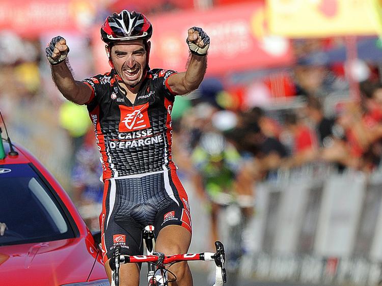 David Lopez of Caisse D'Epargne crosses the finish line to win Stage Nine of the 2010 Vueltas a Espana. (Jose Jordan/AFP/Getty Images) David Lopez of Caisse D'Epargne crosses the finish line to win Stage Nine of the 2010 Vueltas a Espana. (Jose Jordan/AFP/Getty Images)