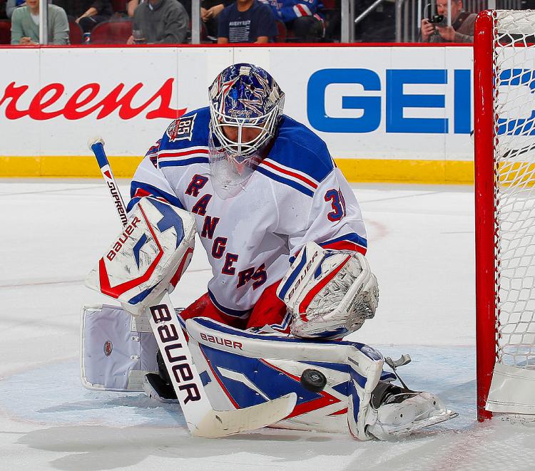 COMES UP BIG: New York Rangers goalie Henrik Lundqvist won the shootout battle against Carolina's Cam Ward on Tuesday. (Paul Bereswill/Getty Images) COMES UP BIG: New York Rangers goalie Henrik Lundqvist won the shootout battle against Carolina's Cam Ward on Tuesday. (Paul Bereswill/Getty Images)