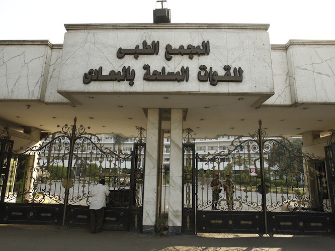 Police officers and military police stand guard at the Maadi military hospital, where ousted President Hosni Mubarak is being treated, on the outskirts of Cairo of June 20. (Mohammed Abed/AFP/GettyImages) Epoch Times Photo