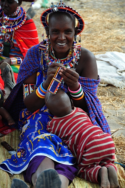 The Maasai women create beadwork in their village for sale at the Sante Fe art market. (Courtesy of ASK) Maasai women create beadwork in their village for sale
