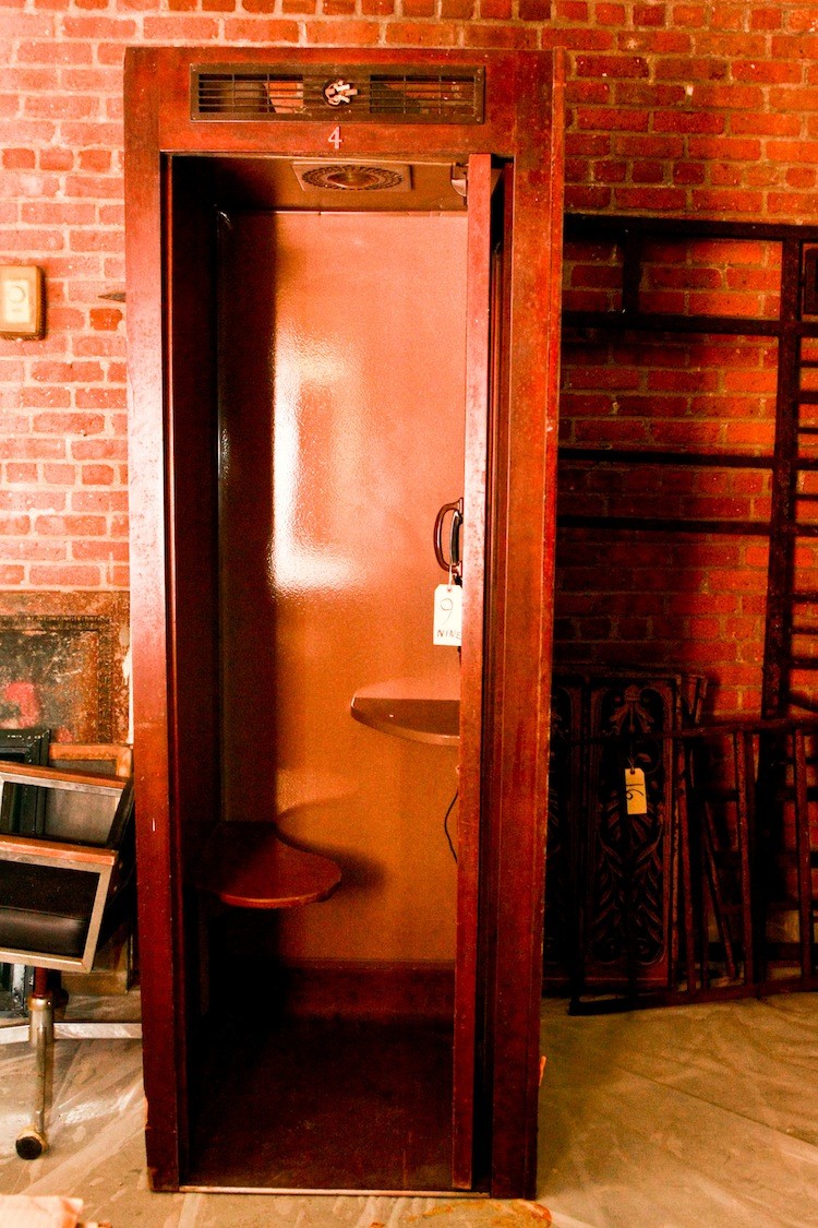 An old phone booth on display at the Landmark and Preservation Council's warehouse in Brooklyn. (Tara MacIsaac/The Epoch Times) An old phone booth on display at the Landmark and Preservation Council's warehouse in Brooklyn. (Tara MacIsaac/The Epoch Times)