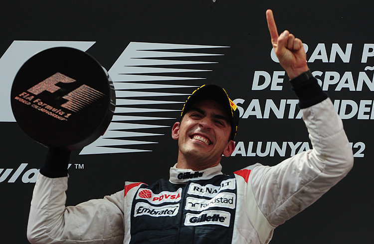 William's Venezuelan driver Pastor Maldo Pastor Maldonado celebrates on the podium at the Circuit de Catalunya after winning the Formula One Spanish Grand Prix. (Dimitar Dilkoff/AFP/GettyImages)