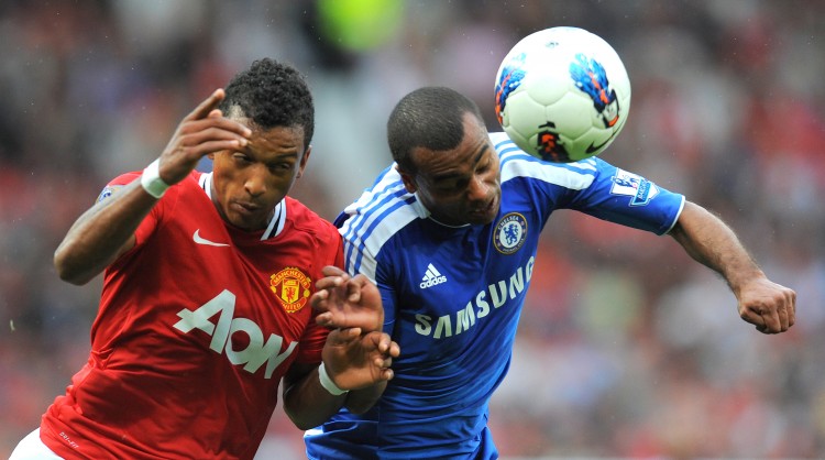 Manchester United's Nani (L) vies for the football with Chelsea's Ashley Cole in an entertaining contest at Old Trafford on Sunday. (ANDREW YATES/AFP/Getty Images) Manchester United's Nani (L) vies for the football with Chelsea's Ashley Cole in an entertaining contest at Old Trafford on Sunday. (ANDREW YATES/AFP/Getty Images)