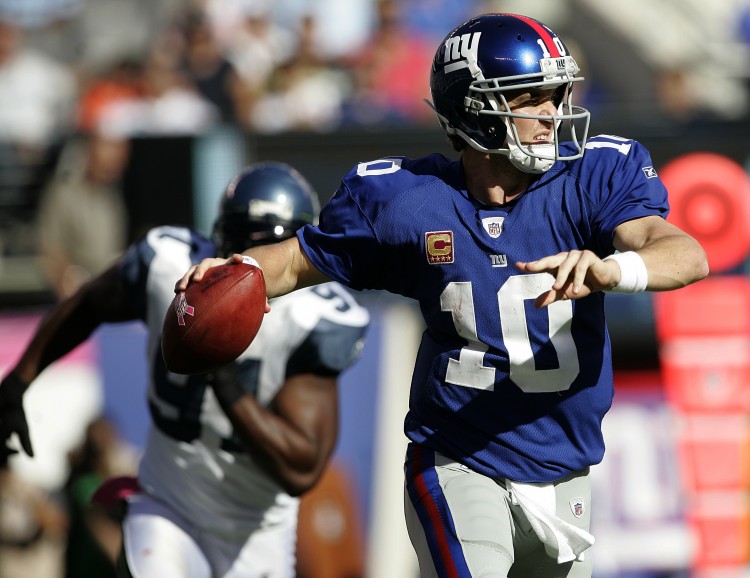 Eli Manning rears back to pass against Seattle last week. The Giants' quarterback had a season-high three interceptions against the Seahawks and can't have a duplication of that performance if they're going to win Sunday. (Rick Schultz/Getty Images) Eli Manning rears back to pass against Seattle last week. The Giants' quarterback had a season-high three interceptions against the Seahawks and can't have a duplication of that performance if they're going to win Sunday. (Rick Schultz/Getty Images)