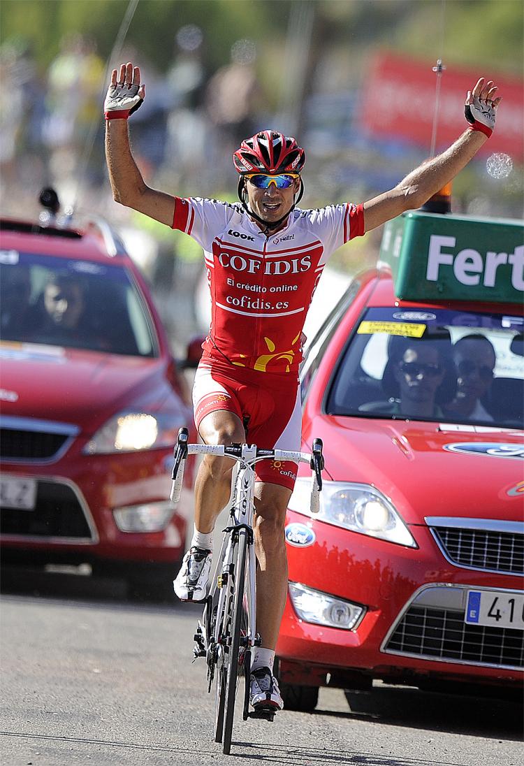 David Moncoutie of Cofidis celebrates as he crosses the finish line to win Stage Eight of the 75th Vuelta a Espana. (Jose Jordan/AFP/Getty Images) David Moncoutie of Cofidis celebrates as he crosses the finish line to win Stage Eight of the 75th Vuelta a Espana. (Jose Jordan/AFP/Getty Images)