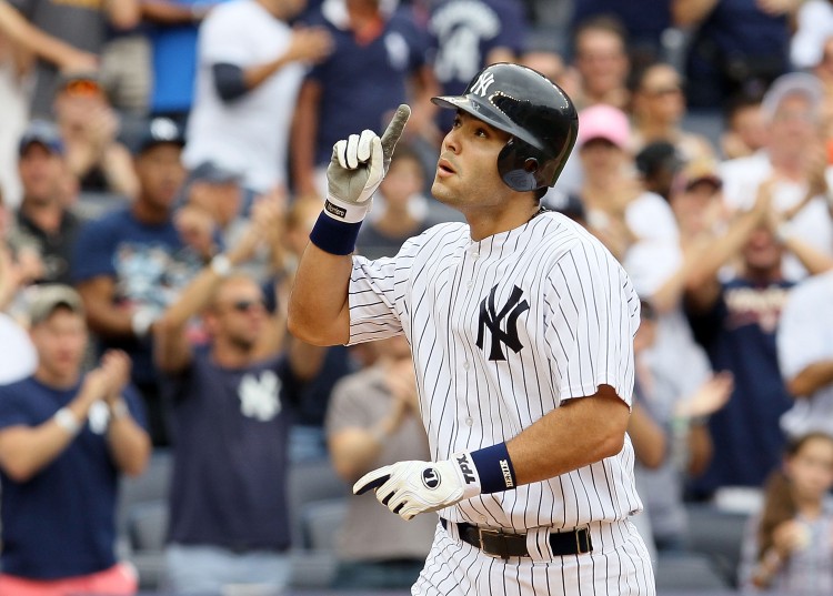FIRST OF MANY: Jesus Montero reacts after hitting his first major league home run�a fifth-inning shot into the right-center field stands that put the Yankees in front 9-8 and, of course, required a curtain call from the jubilant Yankee crowd. (Jim McIsaac/Getty Images ) FIRST OF MANY: Jesus Montero reacts after hitting his first major league home run�a fifth-inning shot into the right-center field stands that put the Yankees in front 9-8 and, of course, required a curtain call from the jubilant Yankee crowd. (Jim McIsaac/Getty Images )
