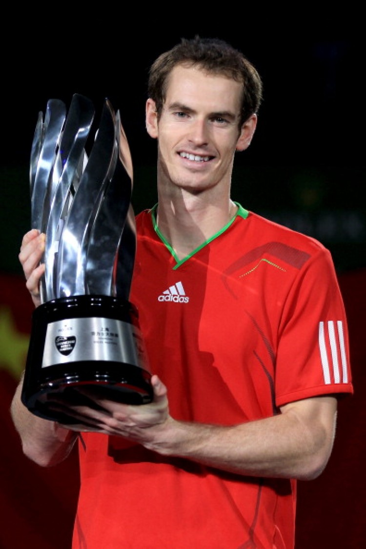 Andy Murray hoists his trophy after defeating David Ferrer 7-5, 6-4 in Shanghai, China at the Shanghai Rolex Masters. (Matthew Stockman/Getty Images)