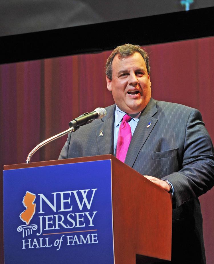New Jersey Governor Chris Christie at the 3rd Annual New Jersey Hall of Fame Induction Ceremony on May 2. In response to Christie's budget cuts, an estimated crowd of 30,000-35,000 protesters rallied in New Jersey on Saturday. (Bobby Bank/Getty Images) New Jersey Governor Chris Christie at the 3rd Annual New Jersey Hall of Fame Induction Ceremony on May 2. In response to Christie's budget cuts, an estimated crowd of 30,000-35,000 protesters rallied in New Jersey on Saturday. (Bobby Bank/Getty Images)