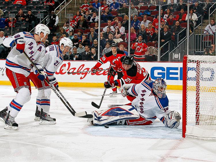 BIG SAVE: New York's Henrik Lundqvist on one of his 43 saves against New Jersey on Wednesday in Newark. (Lou Capozzola/Getty Images) BIG SAVE: New York's Henrik Lundqvist on one of his 43 saves against New Jersey on Wednesday in Newark. (Lou Capozzola/Getty Images)