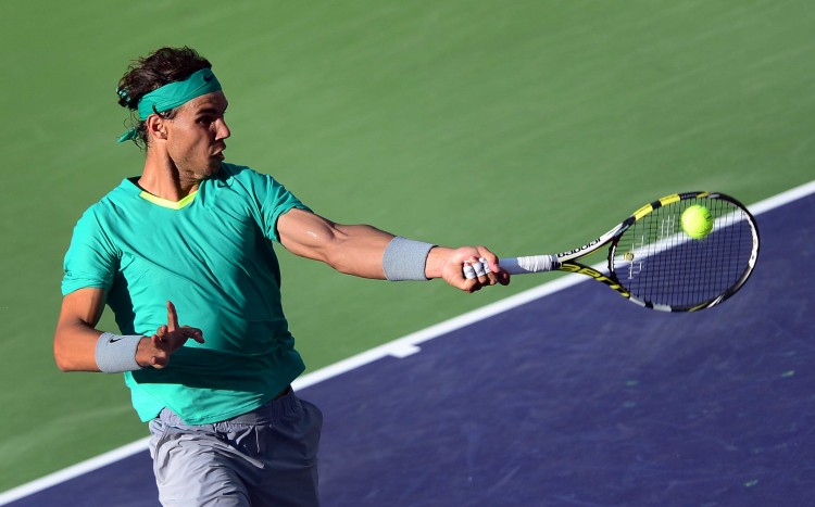 TENNIS-US-ATP-WTA Spain's Rafael Nadal won his record-breaking 22nd ATP World Tour Masters 1000 trophy when he won his third Indian Wells crown on Sunday. The win came as a culmination of his comeback from a seven-month layoff due to a left knee injury. Nadal defeated Argentina's Juan Martin del Potro in three sets for the title. (Frederic J. Brown/AFP/Getty Images)