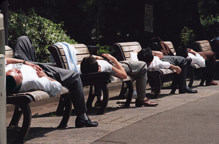 NAPPING: These Japanese businessmen are napping after the noontime meal, which helps enhance brain function, energy, mood, and productivity. Napping also helps regulate the sleep-wake cycles. (Oshikazu Tsuno/AFP/Getty Images)