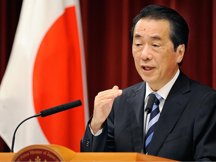 Japanese Prime Minister Naoto Kan answers questions during a press conference in Tokyo. (Toru Yamanaka/AFP/Getty Images)
