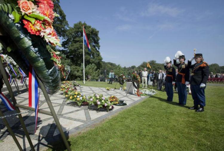 Visitors attend the memorial service of the capitulation of Japan on August 15, 1945 at the Netherland Indonesie monument in The Hague. (Phil Nijhuis/AFP/Getty Images)