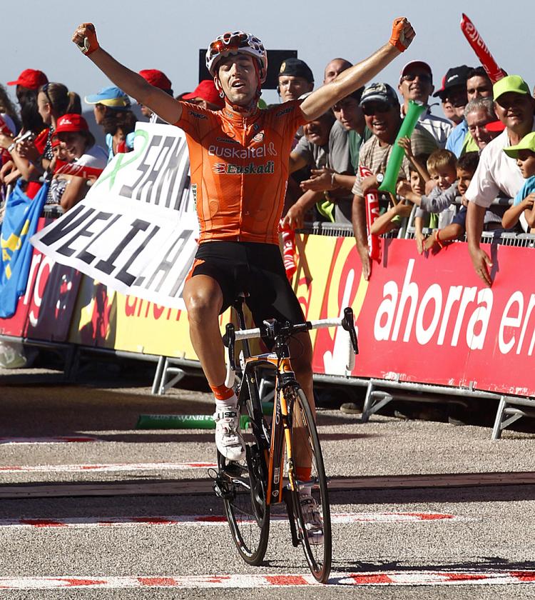 Mikel Nieve of Euskaltel-Euskadi team crosses the finish line of Stage Six of the Vuelta a España, his first Grand Tour victory. (Jaime Reina/AFP/Getty Images) Mikel Nieve of Euskaltel-Euskadi team crosses the finish line of Stage Six of the Vuelta a España, his first Grand Tour victory. (Jaime Reina/AFP/Getty Images)