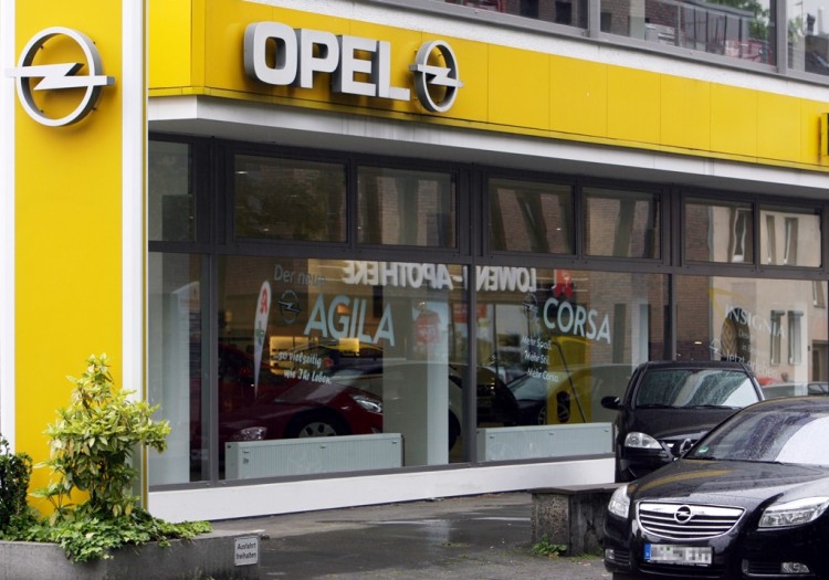 The Opel logo can be seen at an Opel dealership in the western German city of Bochum in this file photo. Opel is in negotiations to close a core plant in Bochum due to sales dropping 18.9 percent compared to last year. (Patrik Stollarz/AFP/Getty Images)
