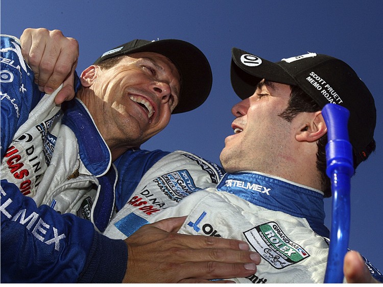 Scott Pruett and Memo Rojas (R) and celebrate their 2011 Grand-Am Rolex Series Daytona Prototype championship after the EMCO Gears Classic at Mid-Ohio Sports Car Course. (Brian Cleary/Getty Images) Scott Pruett and Memo Rojas (R) and celebrate their 2011 Grand-Am Rolex Series Daytona Prototype championship after the EMCO Gears Classic at Mid-Ohio Sports Car Course. (Brian Cleary/Getty Images)