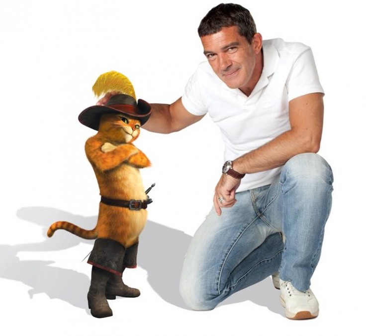 Antonio Banderas, next to the character he acts the voice of, who is a notorious fighter and outlaw that sets off on an adventure to save his town, in the comedy-animation, 'Puss In Boots.' (Courtesy DreamWorks Animation LLC) Antonio Banderas, next to the character he acts the voice of, who is a notorious fighter and outlaw that sets off on an adventure to save his town, in the comedy-animation, 'Puss In Boots.' (Courtesy DreamWorks Animation LLC)