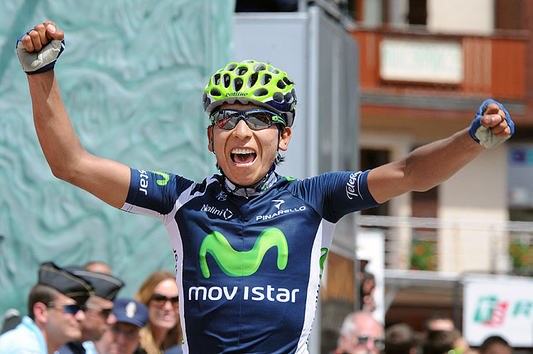 Colombian Alexandre Quintana celebrates Nairo Quintana celebrates on the finish line after winning Stage Six of the Critérium du Dauphiné cycling race. (Pascal Pavani/AFP/GettyImages)