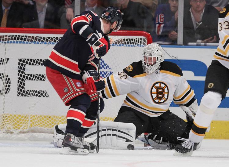 Boston netminder Tim Thomas stones Marian Gaborik. (Al Bello/Getty Images) Boston netminder Tim Thomas stones Marian Gaborik. (Al Bello/Getty Images)