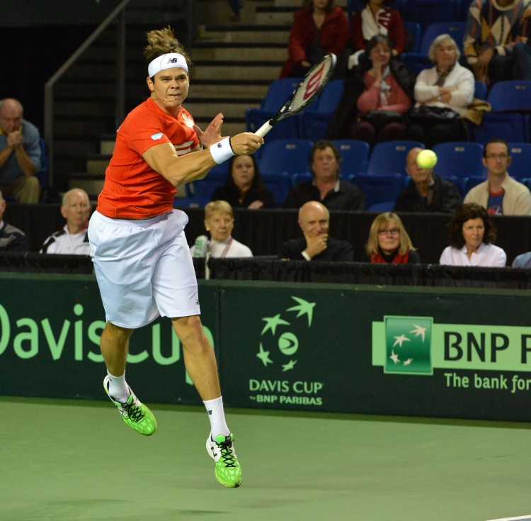 TENNIS-DAVIS-CAN-ESP Milos Raonic of Canada fires a forehand against Spain's Guillermo Garcia-Lopez on Sunday at the Thunderbird Sports Centre in Vancouver. Canada advanced past Spain in Davis Cup to reach the quarterfinals. (Don MacKinnon/AFP/Getty Images)
