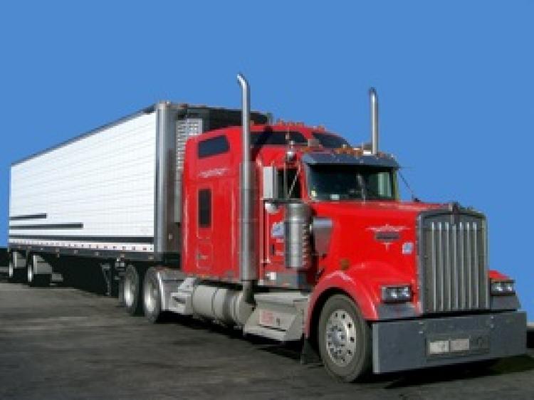 Commercial trucks will be required to improve both mileage and emissions starting in 2014. (PRA/Wikimedia Commons) Commercial trucks will be required to improve both mileage and emissions starting in 2014. (PRA/Wikimedia Commons)