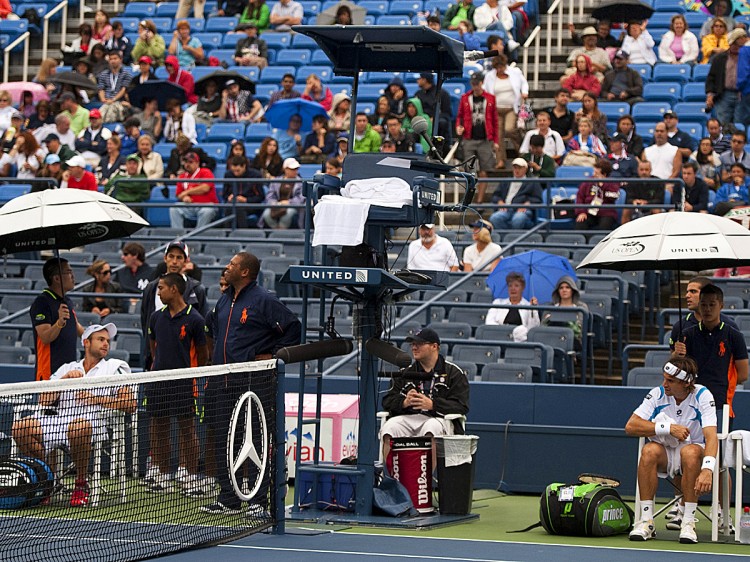 RAIN DELAY: Andy Roddick and David Ferrer wait out a rain delay on Wednesday, September 7 in Louis Armstrong Stadium in Flushing, NY. The players felt that conditions were unsafe at the time and that they should have never been brought on court. They are pondering forming a union to help have their voices heard from now on. (Don Emmert/Getty Images) RAIN DELAY: Andy Roddick and David Ferrer wait out a rain delay on Wednesday, September 7 in Louis Armstrong Stadium in Flushing, NY. The players felt that conditions were unsafe at the time and that they should have never been brought on court. They are pondering forming a union to help have their voices heard from now on. (Don Emmert/Getty Images)