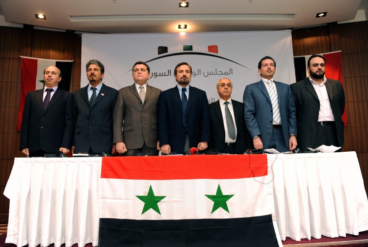 Representatives of the Syrian National Council, at the press conference when they announced the forming of the opposition initiative, August 23. (Bulent Kilic/AFP/Getty Images) Representatives of the Syrian National Council, at the press conference when they announced the forming of the opposition initiative, August 23. (Bulent Kilic/AFP/Getty Images)