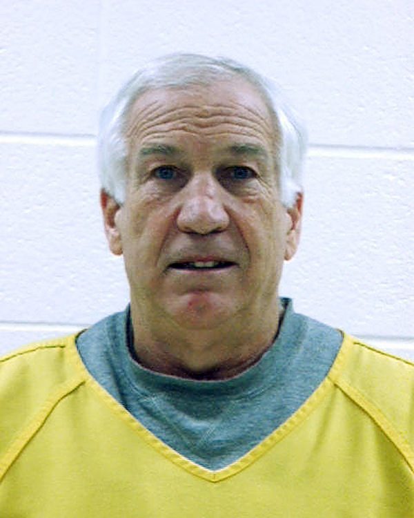 Jerry Sandusky poses for his mugshot