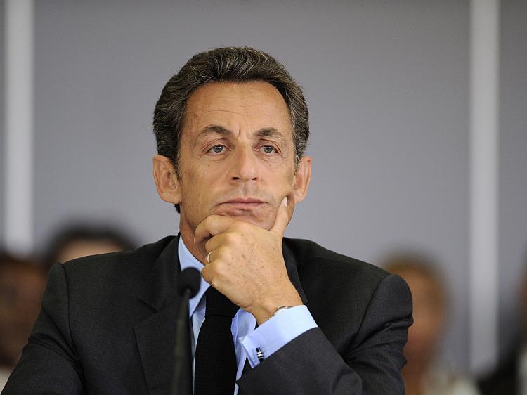 French President Nicolas Sarkozy is now accused of illegally using the French secret service to identify a press informant. (Eric Feferberg/AFP/Getty Images) French President Nicolas Sarkozy is now accused of illegally using the French secret service to identify a press informant. (Eric Feferberg/AFP/Getty Images)