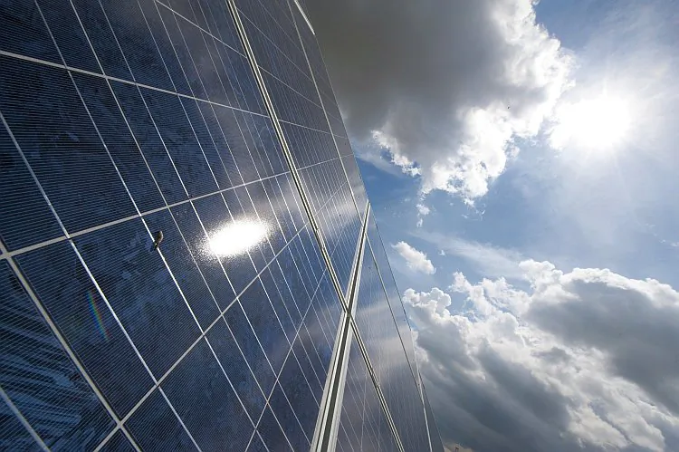 The sun is reflected in a solar panel in this file photo. The BLM is seeking public comment over competitive leases for renewable energy technologies on public lands. (John MacDougall/AFP/Getty Images)