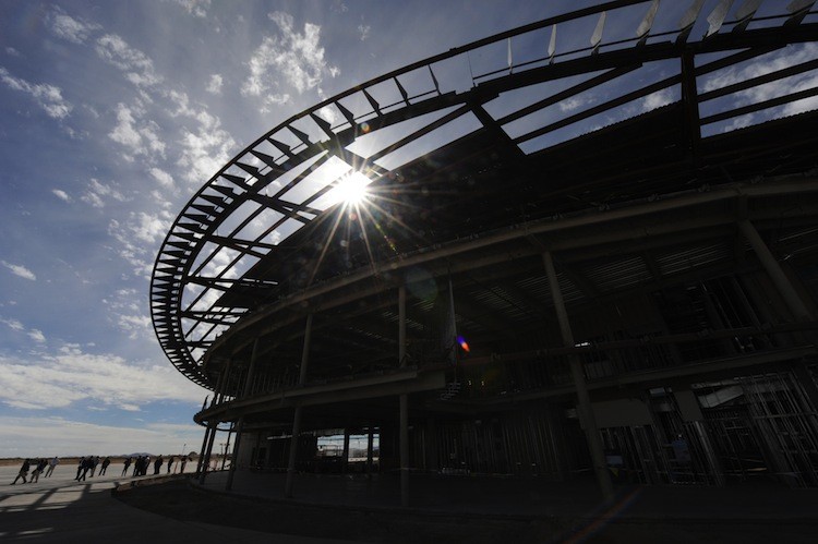SPACEPORT CONSTRUCTION: The new hanger that will house the Virgin Galactic VSS Enterprise at Spaceport America is shown during a runway dedication ceremony near Las Cruces, N.M., last October. (Mark Ralston/Getty Images) SPACEPORT CONSTRUCTION: The new hanger that will house the Virgin Galactic VSS Enterprise at Spaceport America is shown during a runway dedication ceremony near Las Cruces, N.M., last October. (Mark Ralston/Getty Images)