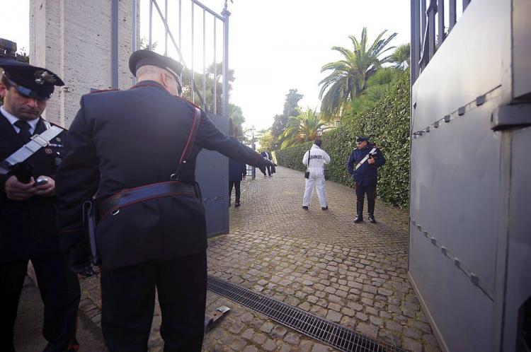 Italian Carabinieri work in front of the main gate of the Swiss embassy in Rome on Wednesday. A bomb exploded there earlier in the day, injuring one, followed by another bomb explosion at the Chilean embassy, which also injured one person, according to reports by ANSA news agency. (Filippo Monteforte/AFP/Getty Images)) Italian Carabinieri work in front of the main gate of the Swiss embassy in Rome on Wednesday. A bomb exploded there earlier in the day, injuring one, followed by another bomb explosion at the Chilean embassy, which also injured one person, according to reports by ANSA news agency. (Filippo Monteforte/AFP/Getty Images))