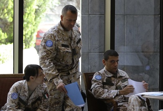 Members of the UN Supervision Mission in Syria (UNSMIS) prepare to leave their Damascus hotel on a monitoring mission May 16, one day after a convoy of UN truce observers came under bomb attack in a Syrian town during a funeral procession. (Louai Beshara/AFP/GettyImages)