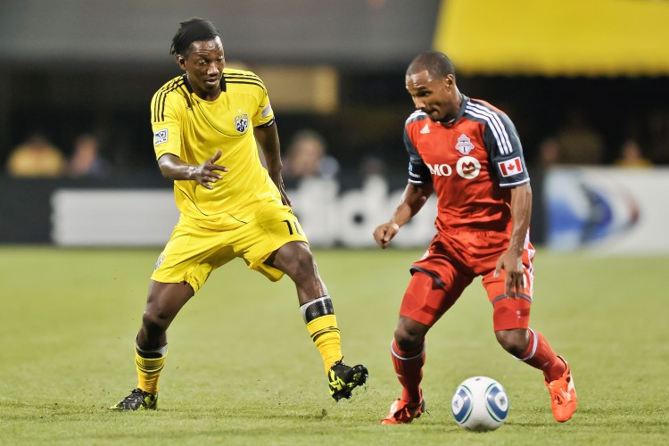Toronto FC's Julian de Guzman takes on Columbus Crew's Andres Mendoza. Toronto FC defeated the Crew 4-2 last Saturday to win the Trillium Cup. (Jamie Sabau/Getty Images) Toronto FC's Julian de Guzman takes on Columbus Crew's Andres Mendoza. Toronto FC defeated the Crew 4-2 last Saturday to win the Trillium Cup. (Jamie Sabau/Getty Images)