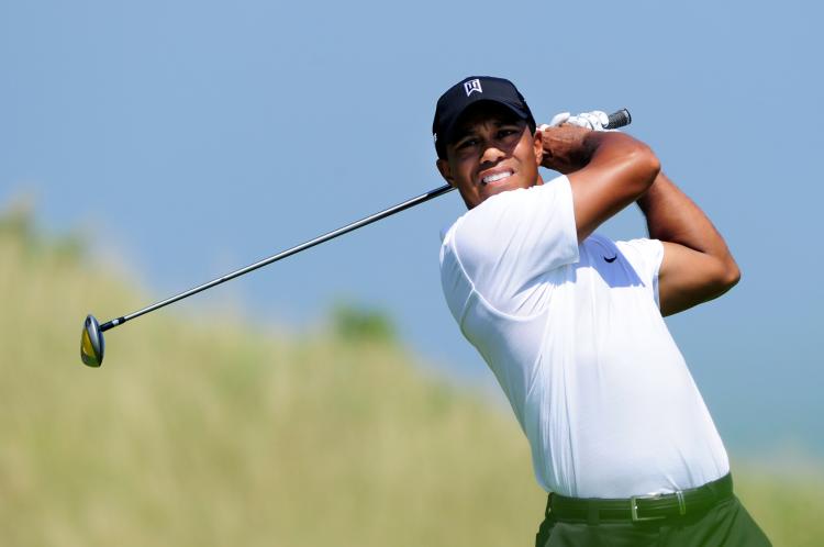 Tiger Woods watches his tee shot on the 14th hole during the first round of the 92nd PGA Championship at Whistling Straits in Kohler, Wisconsin. (Stuart Franklin/Getty Images) Tiger Woods watches his tee shot on the 14th hole during the first round of the 92nd PGA Championship at Whistling Straits in Kohler, Wisconsin. (Stuart Franklin/Getty Images)