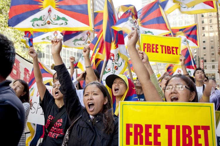 PROTESTING OPPRESSION: Tibetans protesting for freedom from Chinese rule in east Midtown on Tuesday as Chinese Premier Wen Jiabao visits New York for the U.N. General Assembly. (Henry Lam/The Epoch Times) PROTESTING OPPRESSION: Tibetans protesting for freedom from Chinese rule in east Midtown on Tuesday as Chinese Premier Wen Jiabao visits New York for the U.N. General Assembly. (Henry Lam/The Epoch Times)