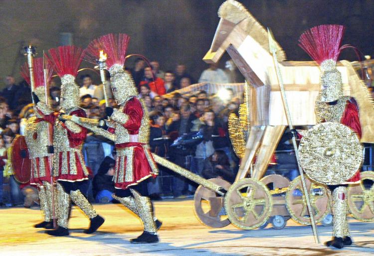 Macedonians dressed as ancient spearmen drag a 'Trojan horse' during the Strumica carnival, in February 2004. (Robert Atanasovski/AFP/Getty Images) Macedonians dressed as ancient spearmen drag a 'Trojan horse' during the Strumica carnival, in February 2004. (Robert Atanasovski/AFP/Getty Images)