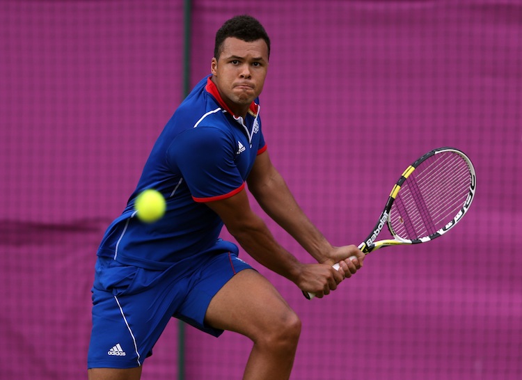 Jo-Wilfried Tsonga won a historic match against Canada's Milos Raonic in Olympic men's tennis on Tuesday. (Clive Brunskill/Getty Images)