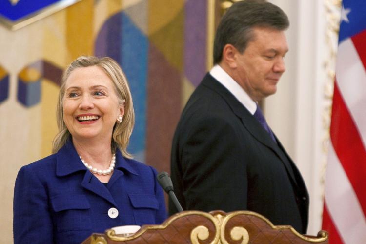 Ukrainian President Viktor Yanukovych walks past Secretary of State Hillary Rodham Clinton ahead of a joint press conference in Kiev, Ukraine on July 2. While Ukraine officially became a nonalligned country in July, halting its process of joining NATO, the country is now considering joining a Russian-led block. (Drew Angerer/AFP/Getty Images )