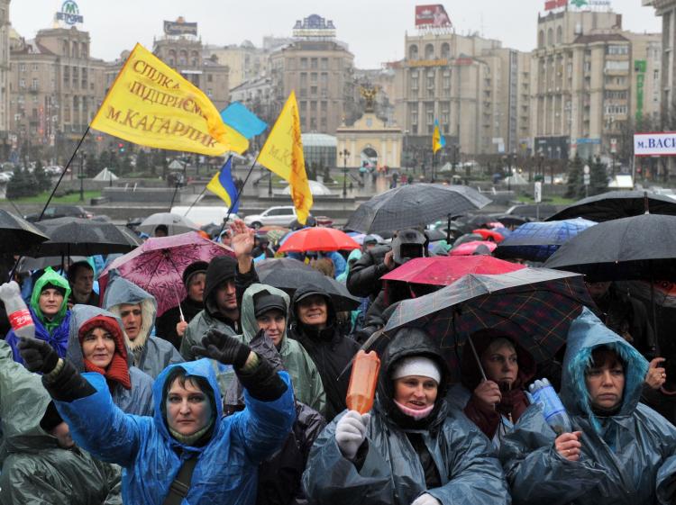 PLEASE LISTEN: Small- and medium-sized business owners rally in Kyiv, on Nov. 23, 2010, against the proposed new unified tax laws, which went into force on Jan. 1. The new rules have increased the tax burden on small businesses forcing many out of business. (Sergei Supinsky/Getty Images) PLEASE LISTEN: Small- and medium-sized business owners rally in Kyiv, on Nov. 23, 2010, against the proposed new unified tax laws, which went into force on Jan. 1. The new rules have increased the tax burden on small businesses forcing many out of business. (Sergei Supinsky/Getty Images)