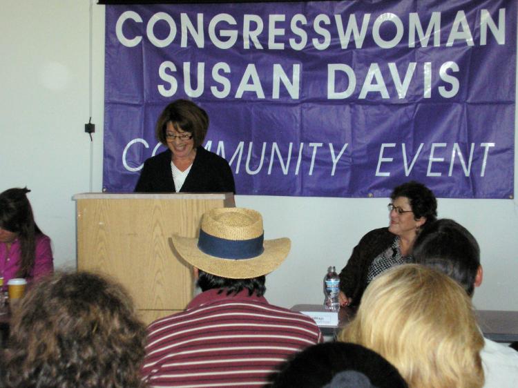 Congresswoman Susan Davis (behind podium) said, 'We do see a movement to create green jobs here in San Diego.' Irene Stillings, one of the panelists (front right), runs the California Center for Sustainable Energy. (Gisela Sommer/The Epoch Times) Congresswoman Susan Davis (behind podium) said, 'We do see a movement to create green jobs here in San Diego.' Irene Stillings, one of the panelists (front right), runs the California Center for Sustainable Energy. (Gisela Sommer/The Epoch Times)