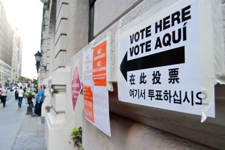 Signs written in several languages guide voters to a polling station at the Prince George Hotel in Midtown, Manhattan for the primary elections on Sept. 15. (Joshua Philipp/The Epoch Times) Signs written in several languages guide voters to a polling station at the Prince George Hotel in Midtown, Manhattan for the primary elections on Sept. 15. (Joshua Philipp/The Epoch Times)